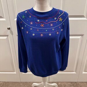 Royal blue Koret Sweater embroidered with flowers and other designs size medium